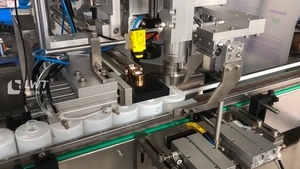 Capsuleuse à vis pour bouteilles en verre