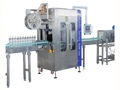 Machine d'étiquetage de manchons rétractables