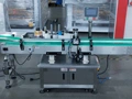 Machines d'étiquetage enveloppantes